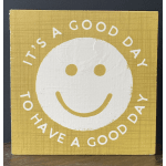 Yellow sign with a white smiley face and the words "It's a good day to have a good day"