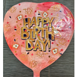 Pink heart-shaped birthday balloon with gold lettering and floral accents