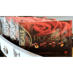 Boxes of dark chocolate assortment with rose packaging