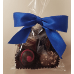 Bag of assorted chocolate truffles tied with a blue ribbon