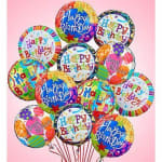 Cluster of colorful birthday balloons on a pink background