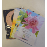 Assorted greeting cards with floral and moon designs