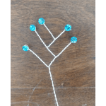Blue jeweled floral picks on twisted white wires