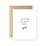 Sympathy card reading "So sorry for your loss" with paw prints