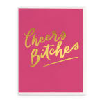 Pink greeting card with gold text reading "Cheers Bitches"