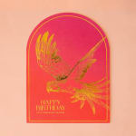 Pink birthday card with a gold bird illustration and text