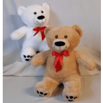 Two teddy bears with red bows, one white and one tan
