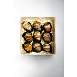 Box of nine chocolate-dipped strawberries with drizzle and toppings in paper cups