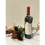 Wine bottle with a small berry floral accent and driftwood