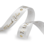 White ribbon with gold thank-you lettering and small flower icons