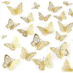 Gold butterfly decorations scattered on a white background