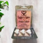 Packaged fall cider wax melts in a plastic clamshell tray