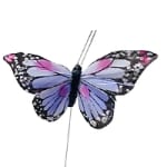 Purple butterfly decoration on a stick