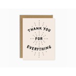 Thank you greeting card with black text on a cream front and brown envelope
