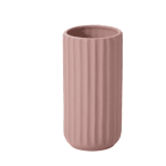 Pink ribbed ceramic vase on a white background