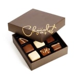 Box of assorted chocolates in a brown gift box
