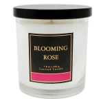 White scented candle in a glass jar with a black lid