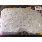 Decorative stone plaque with an engraved quote