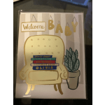 Baby shower card with a chair, books, and potted plant illustration