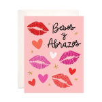 Pink greeting card with lips, hearts, and "Besos y Abrazos" text