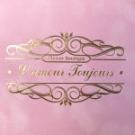 Pink card with gold floral scrollwork and the words "L'amour Toujours"