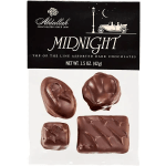 Box of assorted dark chocolates with four pieces shown