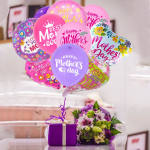 Mother's Day balloon bouquet with a small floral arrangement and gift box