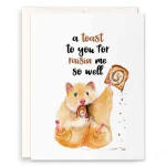 Greeting card with a cat holding toast and the text "a toast to you for raisin me so well"