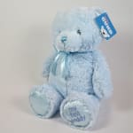 Light blue plush teddy bear with a ribbon and tag