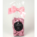 Bag of pink foil-wrapped chocolates with a pink bow