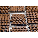 Assorted chocolate candies arranged in trays