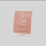 Pink herbal tea packet labeled Cup of Love