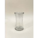 Clear glass hourglass-shaped vase on a plain background