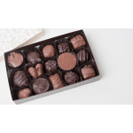 Box of assorted chocolate truffles in dark paper cups