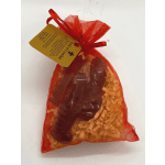 Red organza gift bag with a teddy bear and shredded paper filler