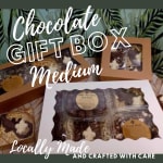 Chocolate gift boxes with assorted treats in windowed packaging