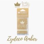 Gold car air freshener package with crown logo and script text