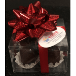 Boxed chocolate gift with a large red bow