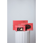 Three boxes of assorted chocolates tied with gold ribbon