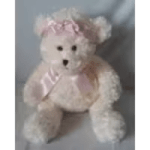 White teddy bear with a pink satin ribbon and bow