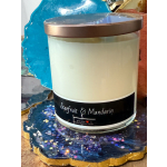 Scented candle in a glass jar with a metal lid