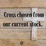 Wooden cross with text on a rustic wood background
