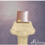 Chocolate gift box on an ornate pedestal against a purple background