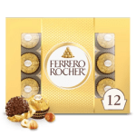 Box of Ferrero Rocher chocolates with several unwrapped pieces and hazelnuts in front