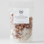 Bag of wildflower sea salt bath soak with a white label