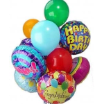 Cluster of colorful latex and foil balloons with birthday and congratulations messages