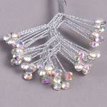 Silver rhinestone hair accessory with dangling crystal strands