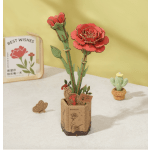 Wooden flower pop-up card in a box with red blooms and a small cactus ornament