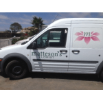 White florist delivery van with Matteson’s Florist logo