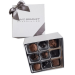 Box of assorted chocolates with a ribbon bow